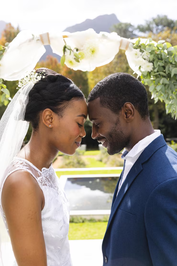 imgi_13_happy african american bride groom touching heads smiling wedding arch sunny garden_13339 350766